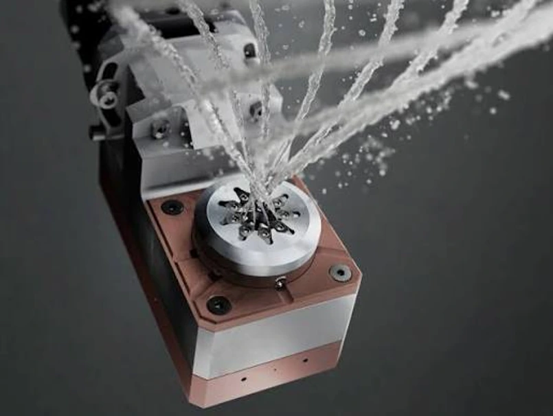 Coolant delivery to a whirling head